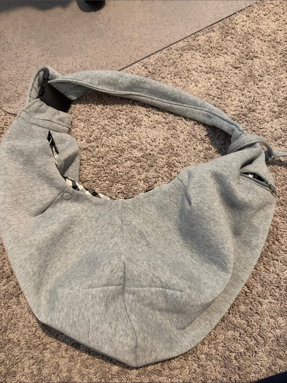 Pet carrier sling with adjustable strap